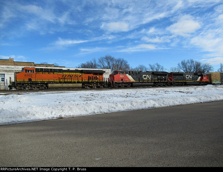 BNSF 8352, CN 3064, and CN 5469